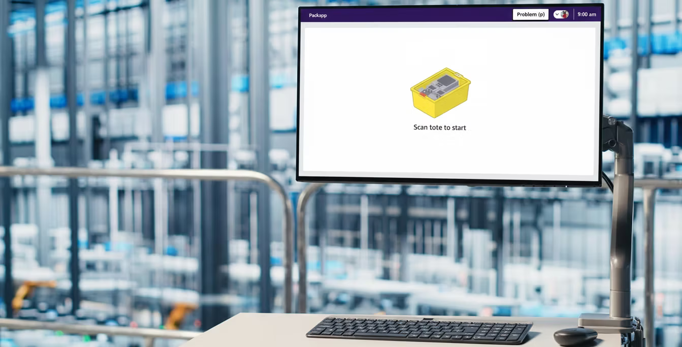 Amazon PackApp hero: associate at packing station